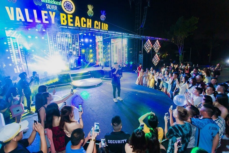 The lively atmosphere at the outdoor bar.