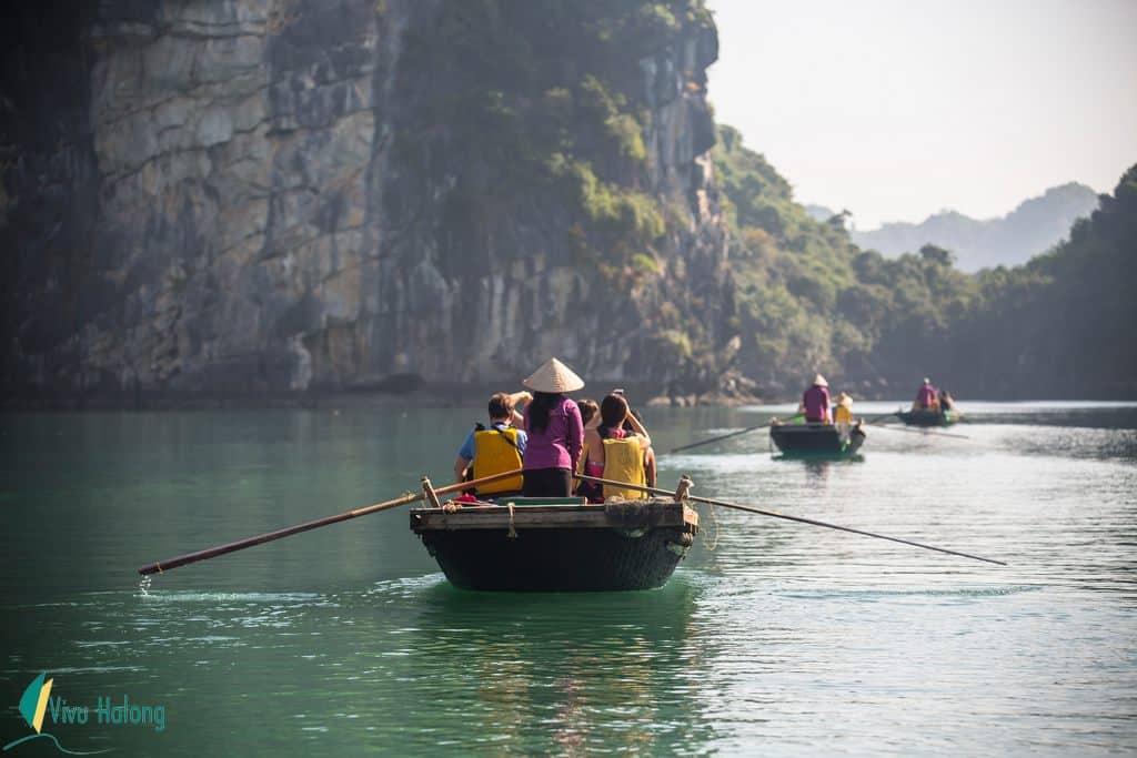 Local bamboo boat to visit Vung Vieng fishing village