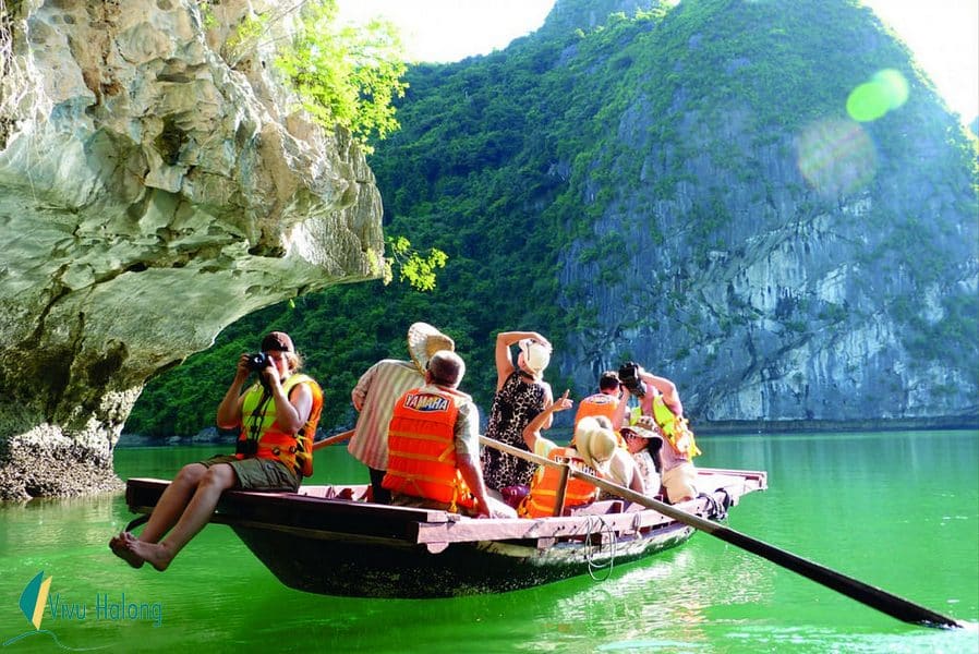 Explore Bright and Dark cave by local bamboo boat