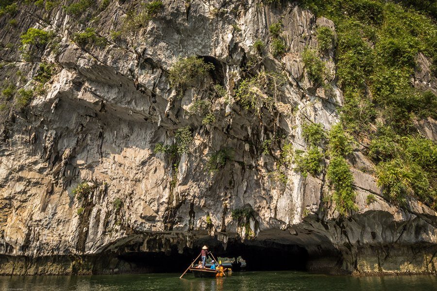 Visit Bright cave by local bamboo boat