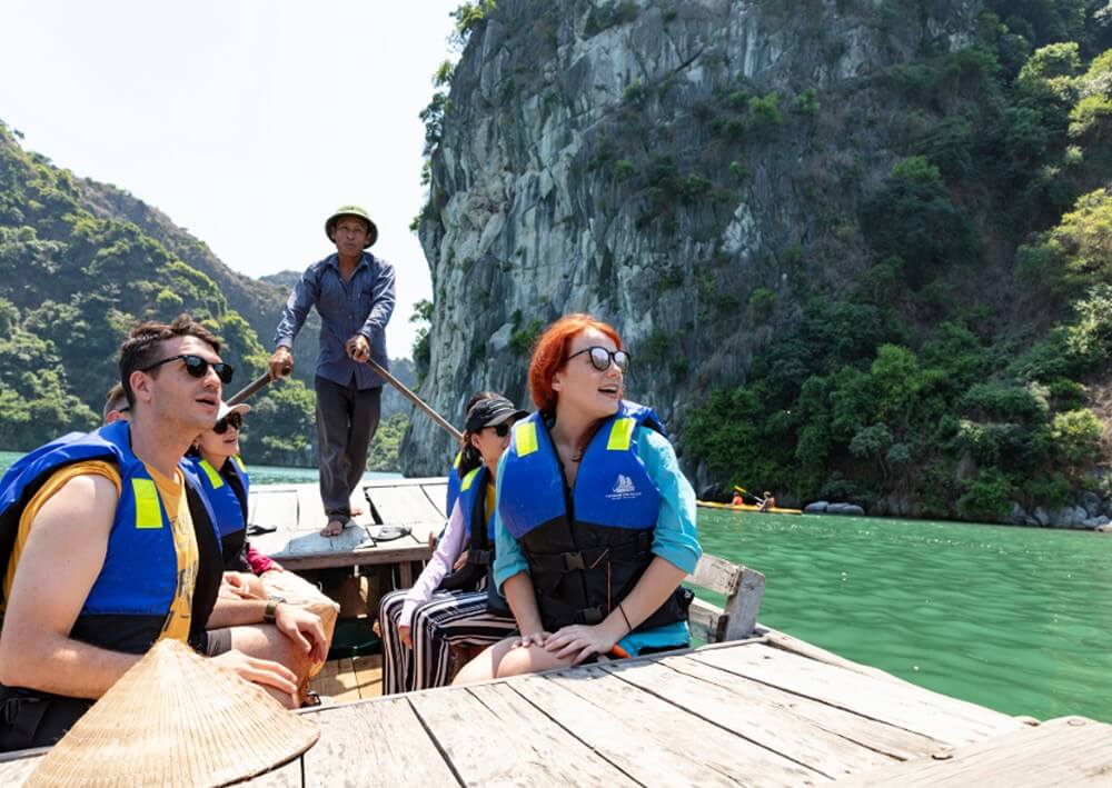 Visit Bright cave on bamboo boat