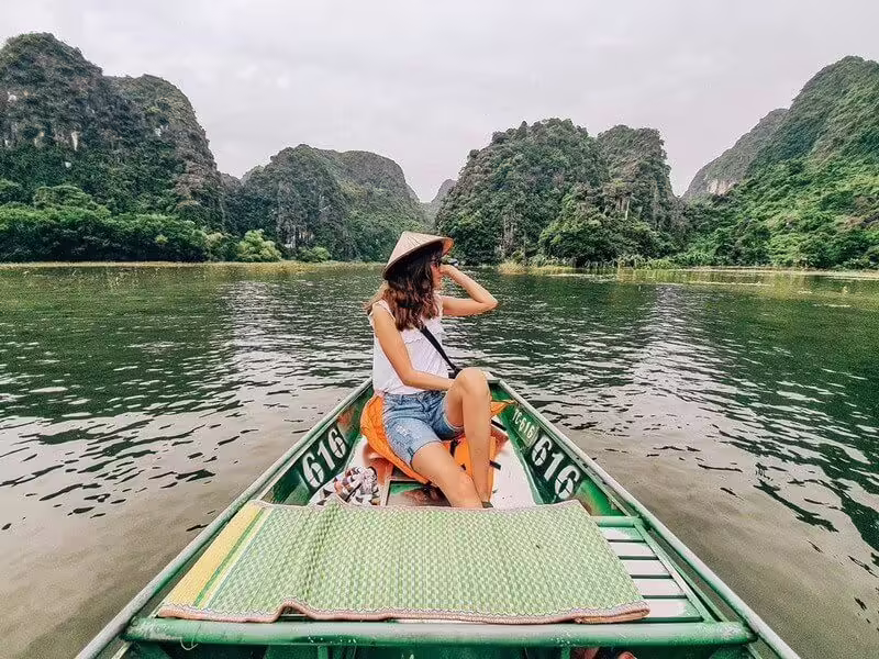 Take a bamboo boat in Tam Coc