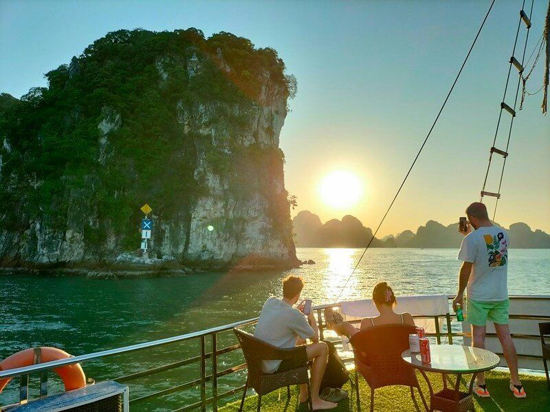 Admire sunset on Halong Bay